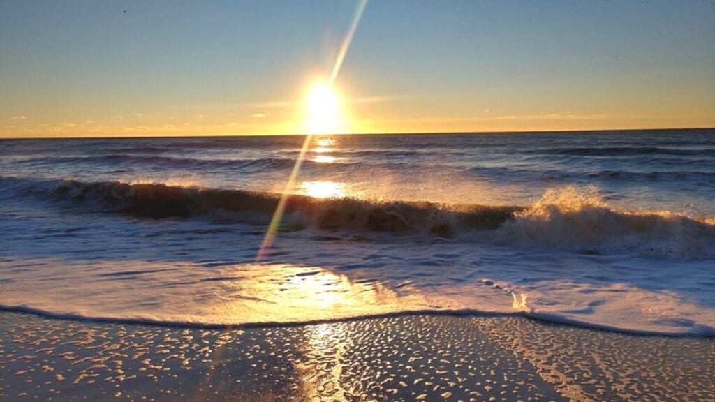Sunrise over the ocean waves in Myrtle Beach, SC.
