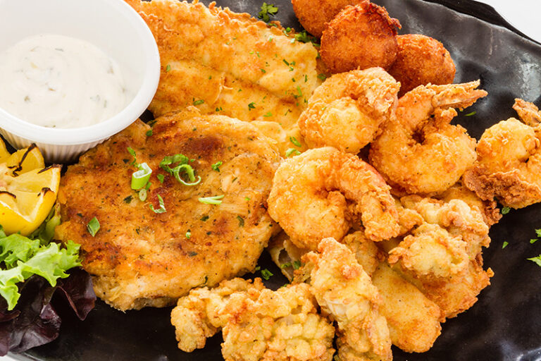 Fried seafood platter next to the beach