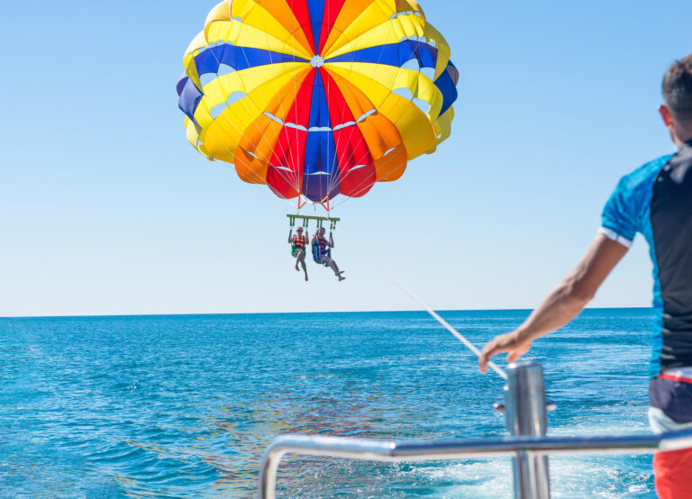 Happy couple Parasailing in Myrtle beach in summer
