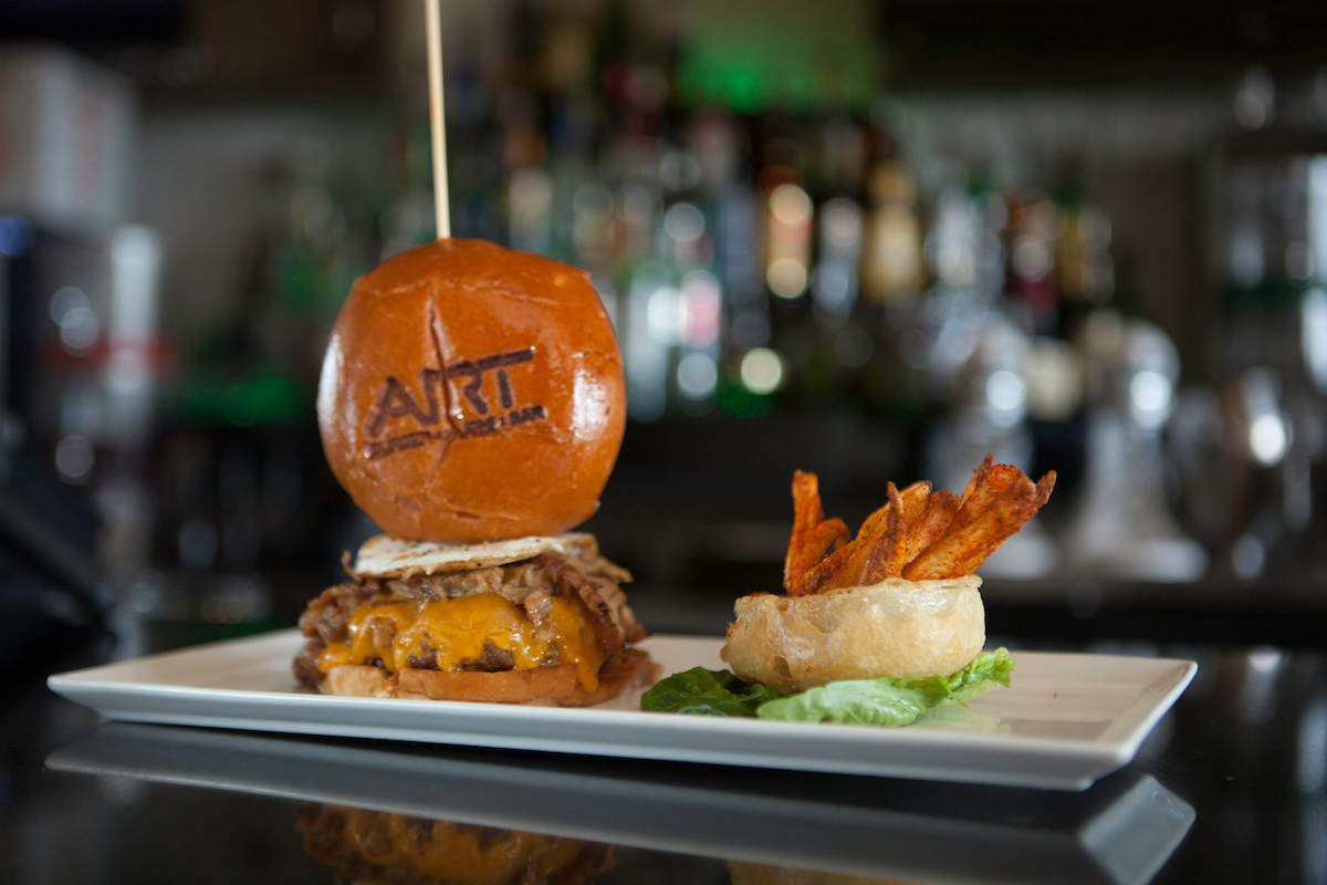 a burger and fries on a plate